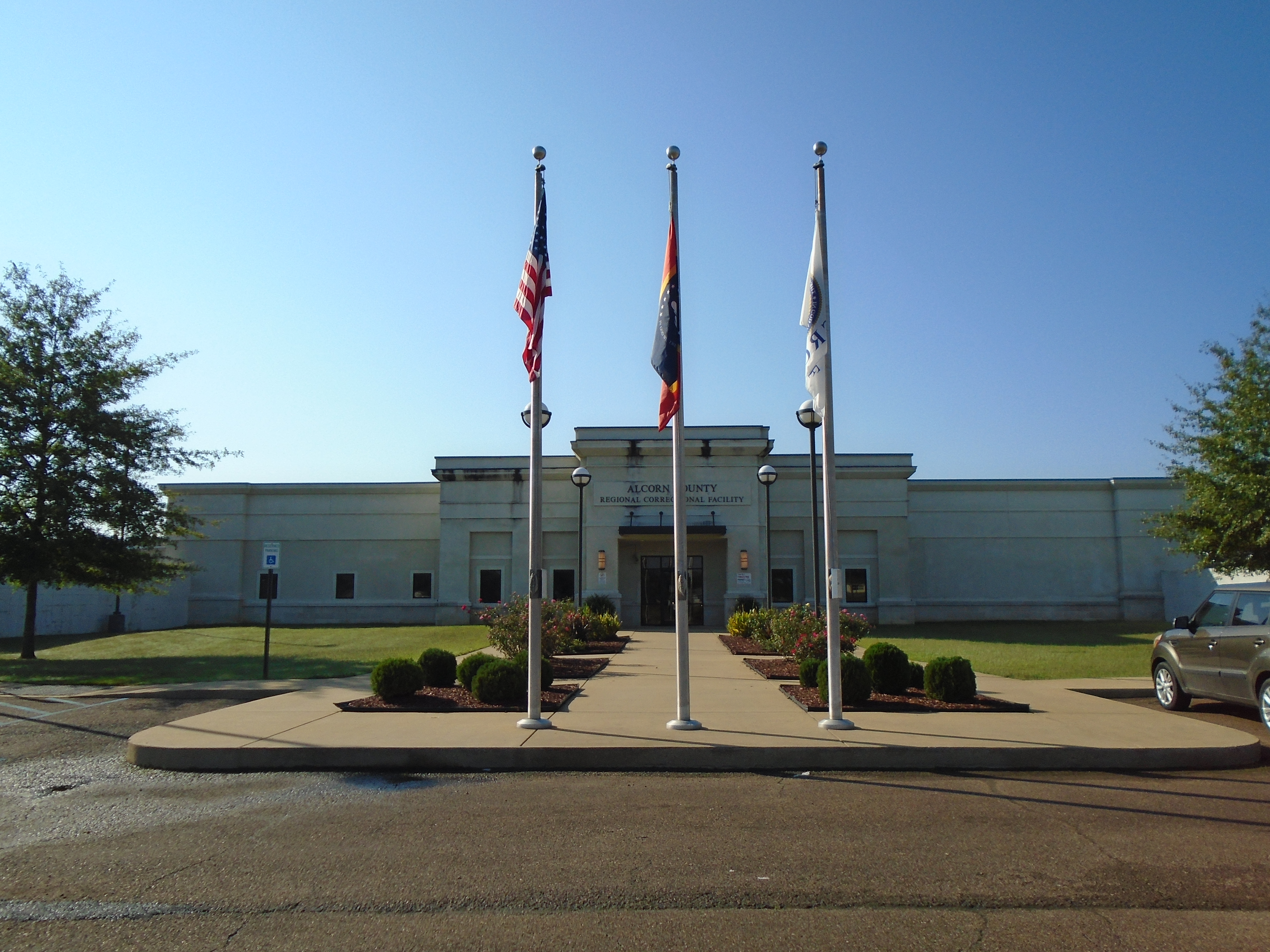 Alcorn County Correctional Facility Main entrance flags
